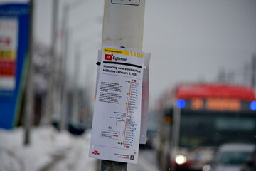 Naklejka premium Toronto public transport TTC 34 Eglinton East Bus on Eglinton Avenue. Toronto, Ontario, Canada, February 6, 2026: Toronto public transport TTC 34 Eglinton East Bus makes its way along Eglinton Avenue 