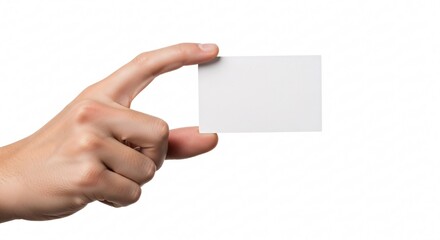 Obraz premium Close-up of a person's hand holding a blank white business card against a plain white background for professional and corporate use
