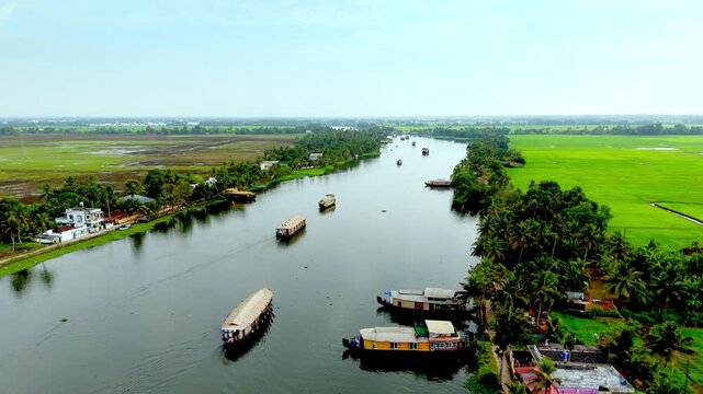 Kerala House boats floating in kuttanadu canal alappuzha , areal view of Alappy canal kuttanadu