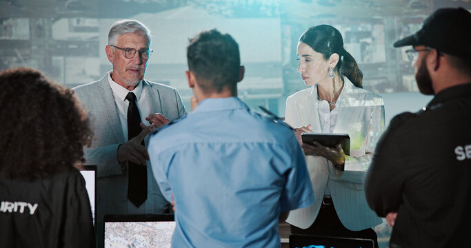 Security, presentation and group in control room with people for strategy, planning for satellite surveillance. Government, briefing and team in cctv command center at intelligence agency or meeting