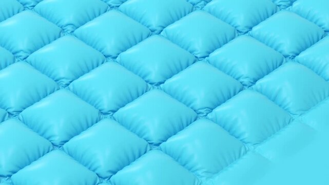 Abstract diagonal pattern of inflating light blue diamond shapes on a plain background, motion graphic