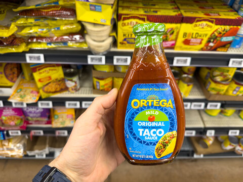 Ortega Mild Original Taco Sauce Bottle Handheld In Grocery Store