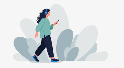 Vector illustration of a young woman listening to music with headphones and using her smartphone while walking outdoors with abstract plants in the background © Purnomo