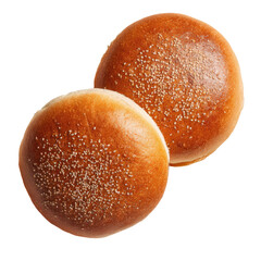 Two golden, round buns with sprinkles, against a dark, isolated backdrop