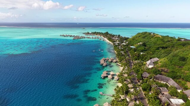 Bora Bora Island, French Polynesia. Drone Shot of Matira Beach and Luxury Resort With Villas Over Lagoon Water