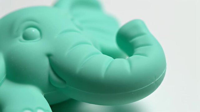 Macro Close-up of Teal Elephant Silicone Baby Teething Toy Footage