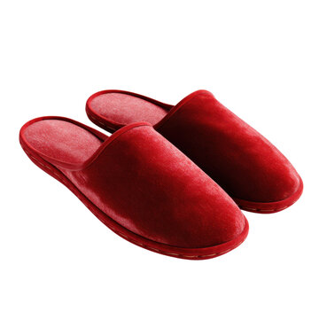 Pair of red velvet slippers isolated on Transparent Background