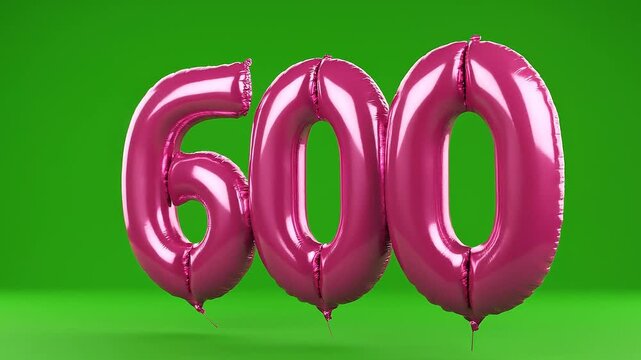 Rotating Number 600 Pink Foil Balloons on Green Screen
