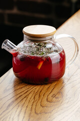 fruit tea in a glass teapot