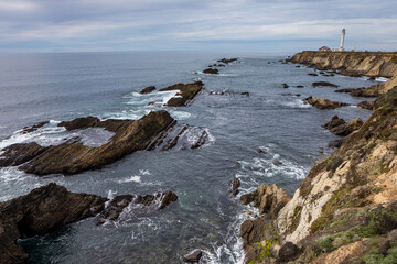 Scenic Coastal Cliffs With Lighthouse Overlooking the Ocean and © Cavan