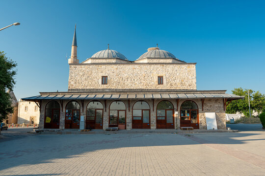 Beysehir, Konya, Turkey - August 18, 2025: Historic Beysehir Bedesten showcasing traditional shops and stone arches