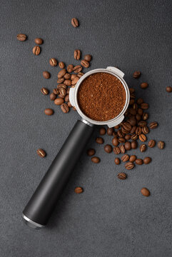 Espresso Portafilter with Ground Coffee and Beans