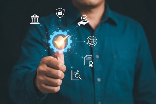 Business expert validating digital compliance and secure information management by interacting with a protective virtual shield.