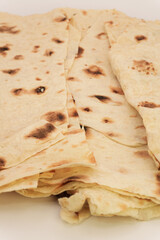 Traditional Armenian lavash, flat bread or pita, nutritious food, Bread for burritos and tacos. top view, flat lay, copy space High quality