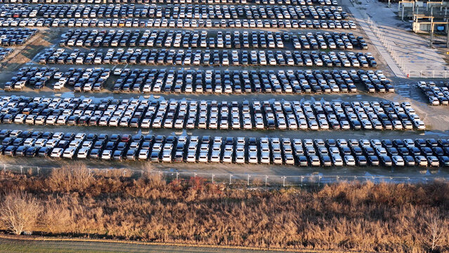 Huge lot full of brand new cars displaying mass production