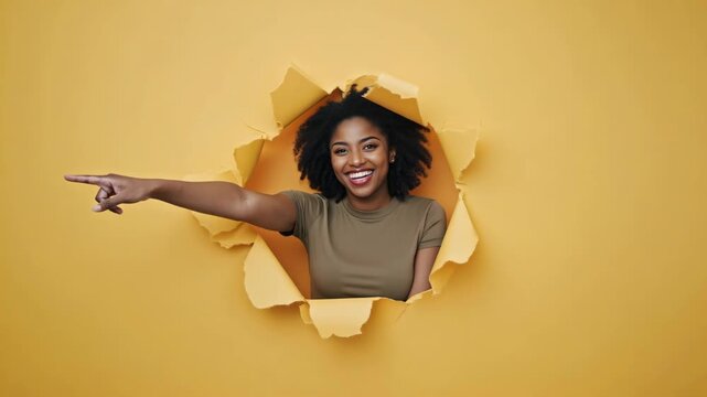 A cheerful woman making a gesture of attention towards the viewer