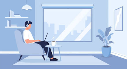 Obraz premium Man working from home on laptop wearing headphones.