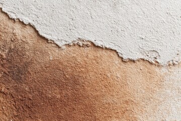 Textured wall surface with brown and white color contrasting patterns