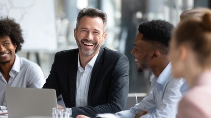 Two businessmen sharing a laugh in a modern office
