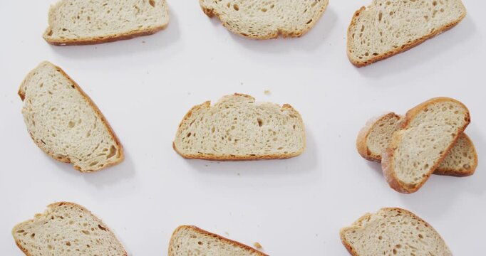 Video of slices of bread seeing from above on white background