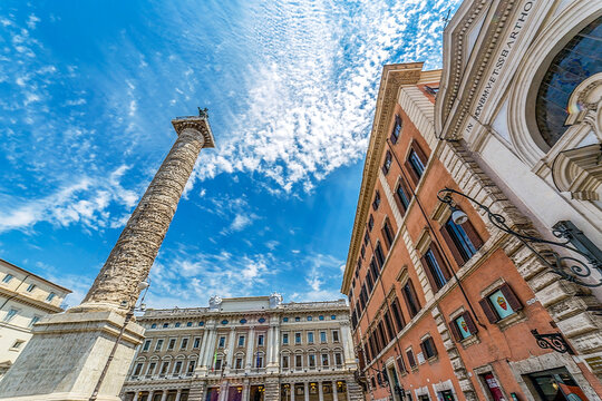 Column of emperor Marco Aurelio in Piazza Colonna, with engraved the story of the campaign conducted by  against the germans. Saint Paul bronze statue at the top. Rome, Italy
