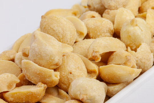 Close up of fried peanuts with salt in a bowl