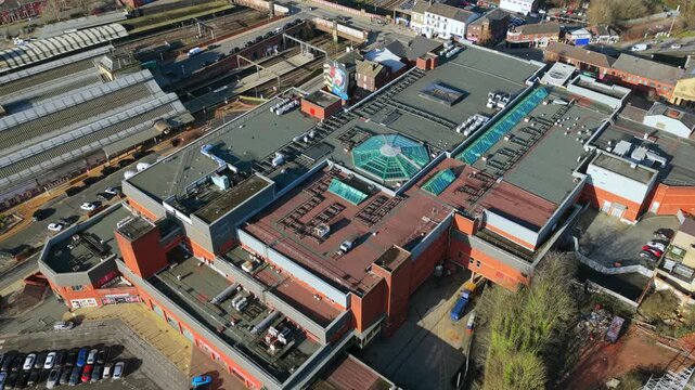 Aerial video of a Shopping Centre and Preston Railway Station infrastructure in Lancashire, UK. 