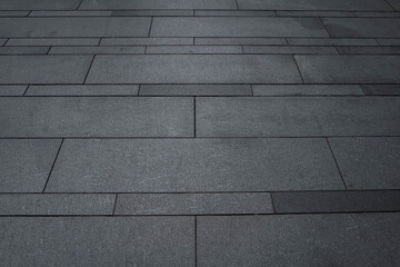 Grey brick stone street road. Light sidewalk, pavement texture. Granite outdoor tiled floor. © Sopear
