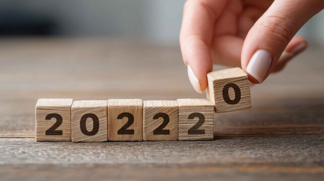 Wooden Blocks Displaying Year Change from 2022 to 2023 Close Up