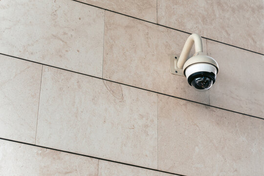 Outdoor panoramic CCTV camera on the building's facade
