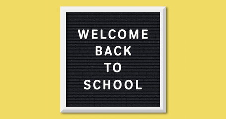 Welcome back to school text on letter board 4k