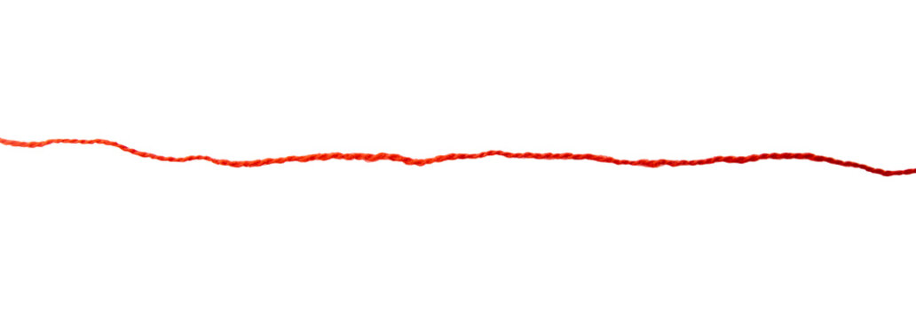 Red thread isolate on white background. Selective focus. Old.