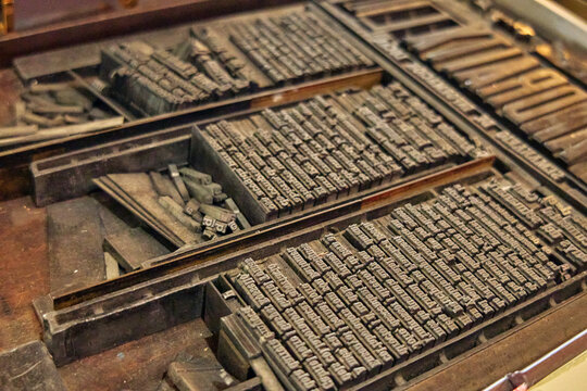 Historic sets of metal movable type preserved as part of printing heritage, displayed in a museum environment in the Capital of Mallorca, Spain.