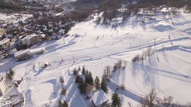 The Pr&eacute;long - Place de l'Aravet Snow Front Within The Serre Chevalier Ski Resort In France. Aerial Shot