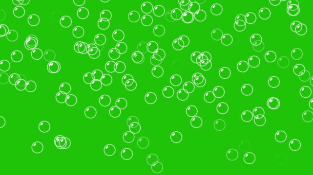 Rising air bubbles- Water bubbles rising on green screen background. Foam bubbles random animation. White champagne bubbles rising upwards. Soap bubbles floating and moving slowly in the green sky.