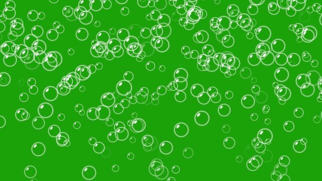 Rising air bubbles- Water bubbles rising on green screen background. Foam bubbles random animation. White champagne bubbles rising upwards. Soap bubbles floating and moving slowly in the green sky.