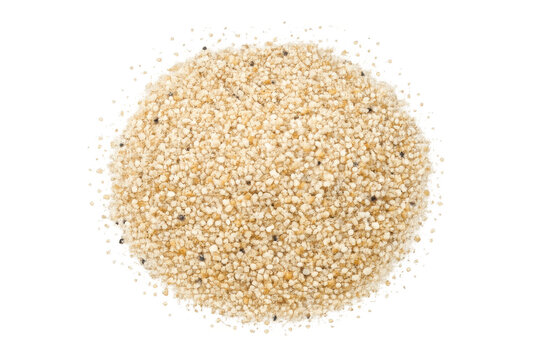 Pile of uncooked quinoa seeds with a black background, top view