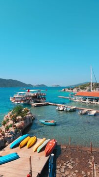 Kalekoy, Demre, Turkey - June 14, 2025: Simena Castle is an ancient Lycian fortress in Kalekoy village of the Demre district in the Antalya Province of Turkey.