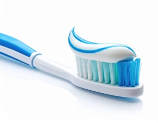 Blue and white toothbrush with fresh striped toothpaste applied to its bristles, ready for daily oral hygiene against a clean white background
