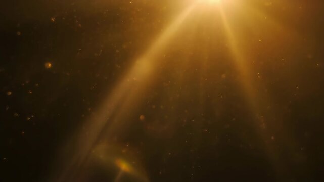 Golden Light Rays with Floating Dust Particles in Dark Background.