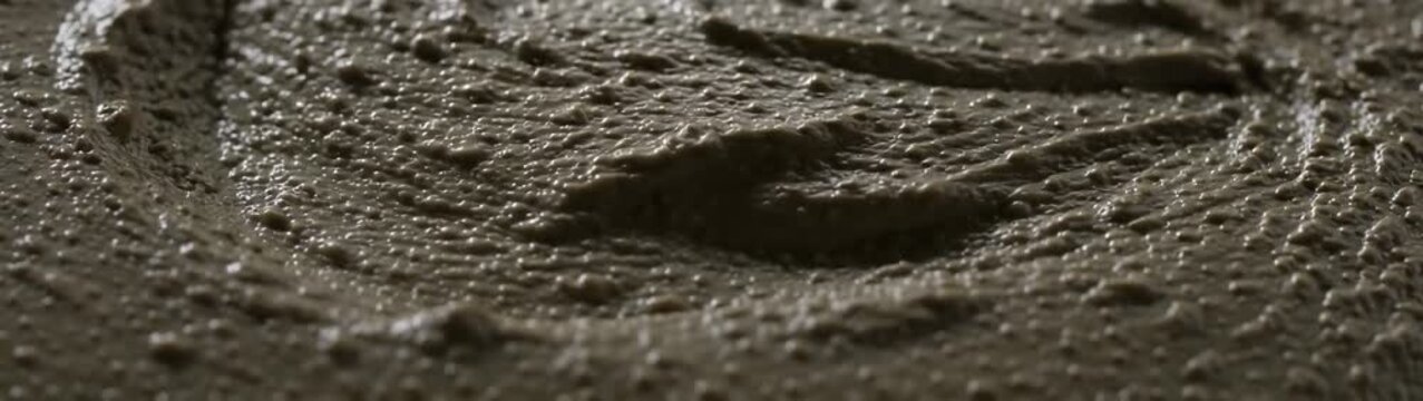 Concrete being poured into a mold