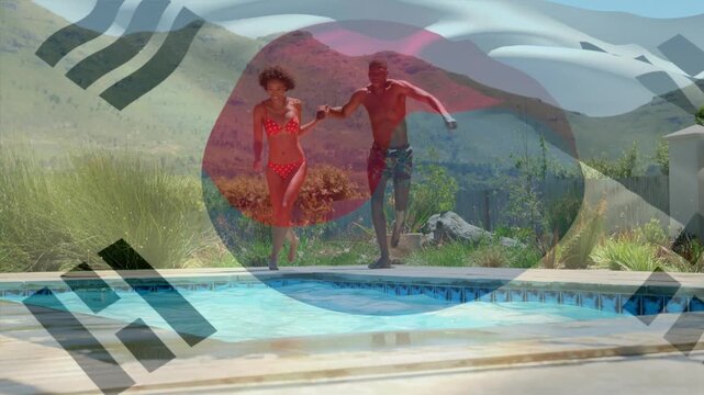 Animation of flag of south korea over happy diverse couple having fun at swimming pool