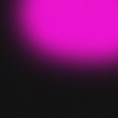 Obraz premium A vibrant magenta light spot shines brightly on a dark background image file