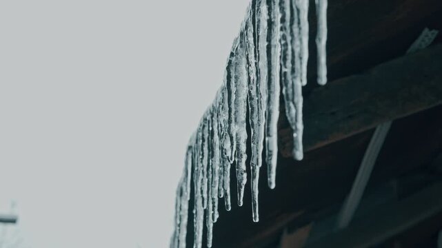 Icicle Cascade From Wooden Eaves, Barn Owner Surveying Damage, Long Crystalline Stalactites Dripping