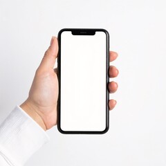 a person holding an iPhone with a blank white screen, fingers gripping the edges, soft natural light illuminating the device