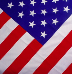 Obraz premium Iconic stars and stripes – A section of the American flag of fifty white stars on a blue field, symbolizing the unity of the 50 United States.