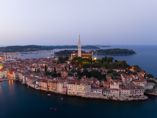 Fototapeta premium Aerial sunrise view of Rovinj old town at blue hour, Croatia