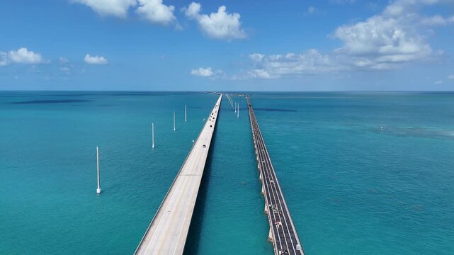 The newer Seven Mile Bridge and the original, historic Old overseas highway, now a bike / walking trail, running parallel to the new highway at Marathon in the Florida Keys, United States