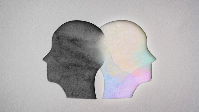 Two head silhouettes visible beneath the cut paper, one in bright and vibrant watercolors and the other in dark gray. Concept illustration of states of mind and mental health awareness and illness.