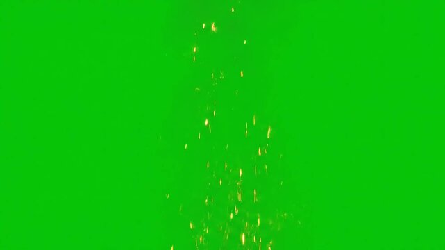 Golden particles falling on a green background.